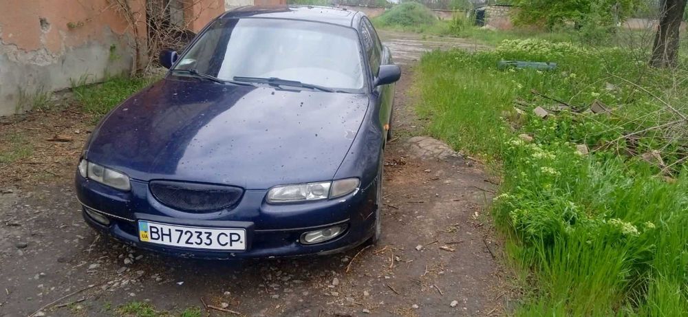 Автомобіль Мазда Кседос 6