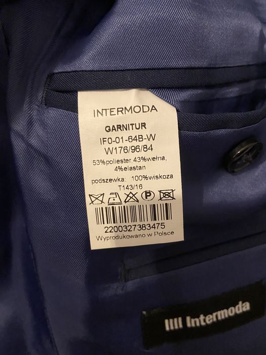 Niebieski garnitur marki Intermoda/Bytom