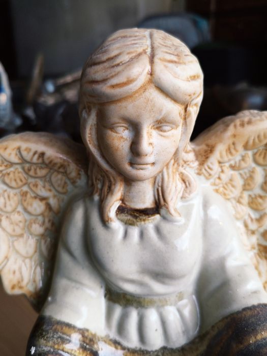 Anjinho de porcelana