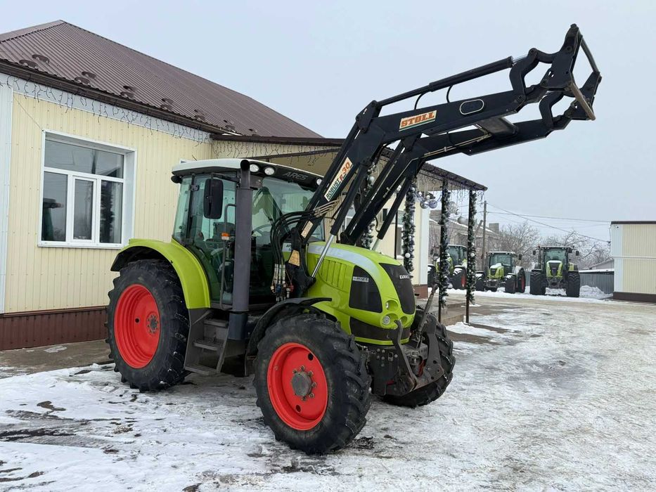 Трактор Ares 557 З фронтальним навантажувачем