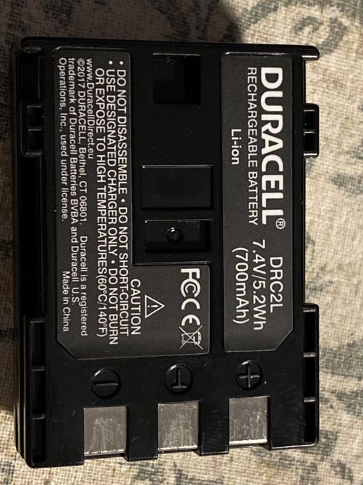 Carregador e bateria nova para câmara Canon