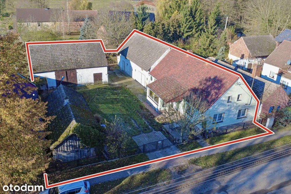 Dom z warsztatem, stodołą i oborą