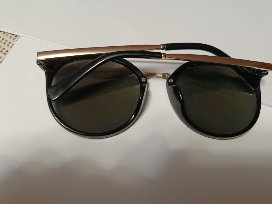 Окуляри сонцезахисні. Оригінальні
