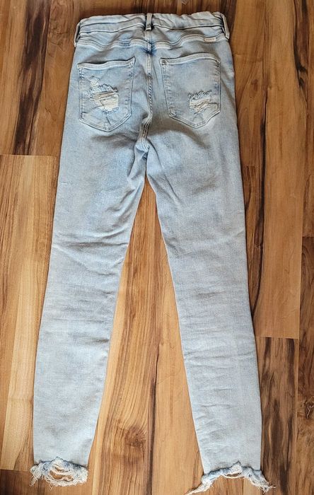 Spodnie damskie dopasowane jeansowe 38