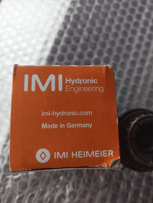 Термоголовка на радиатор отопления Германия