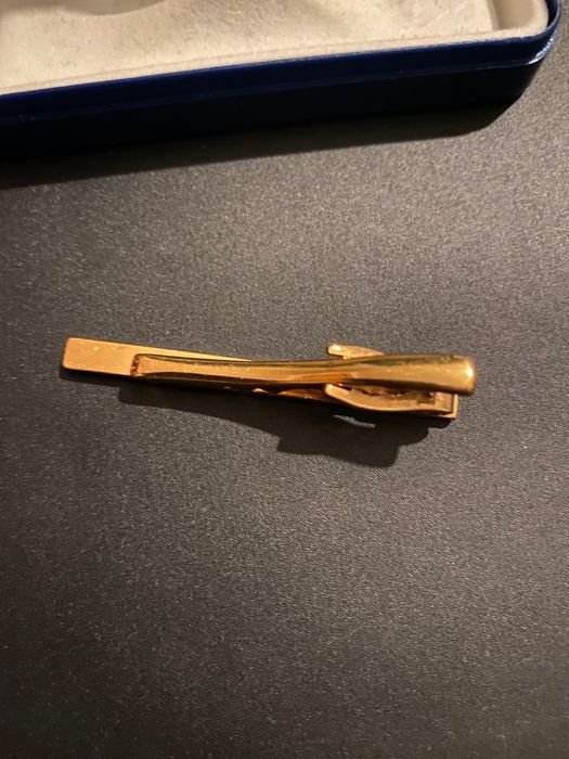 Alfinete para gravata dourado