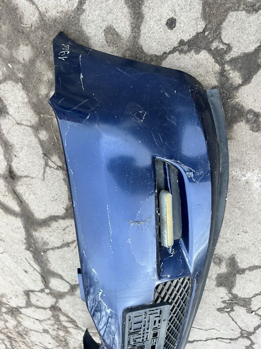 Передній бампер Mazda 2  Мазда 2 2003-2007