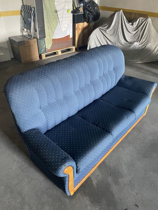 Sofá cama com três lugares