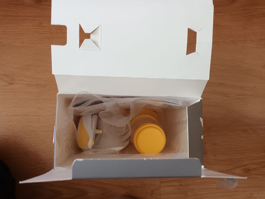 Medela Store & Feed Set e Bomba Tira-Leite Manual Harmony novo