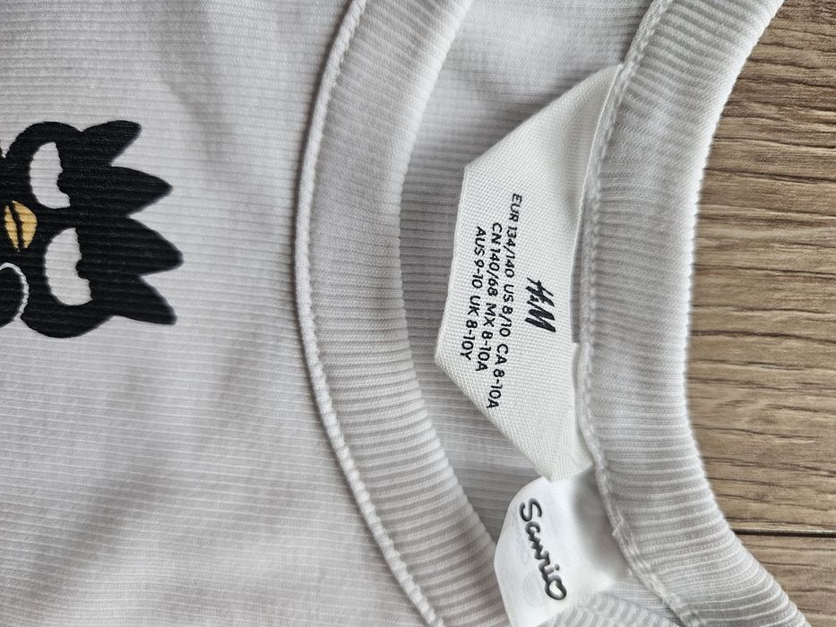 Biały crop top H&M 134/140
Dł całk ok.38cm, szer pod pachami ok