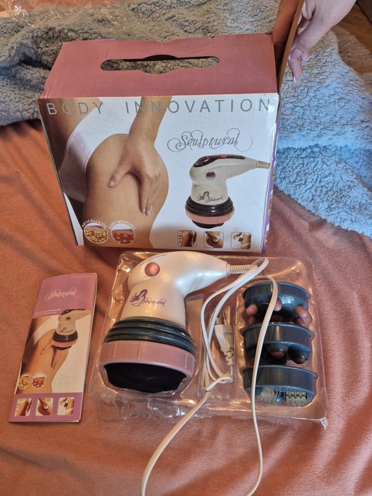 Компактний масажер