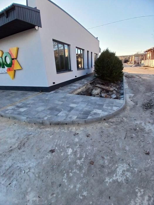 Укладня бруківки, (тротуарної плитки))