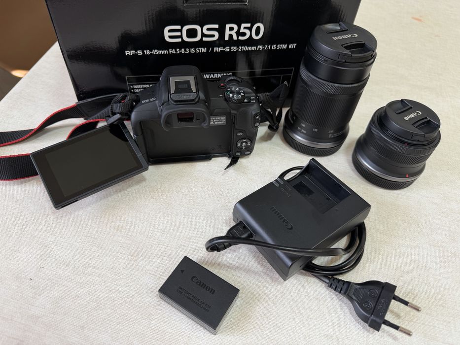 Canon R50 + objetiva 18-45mm + objetiva 55-210 + carregador
