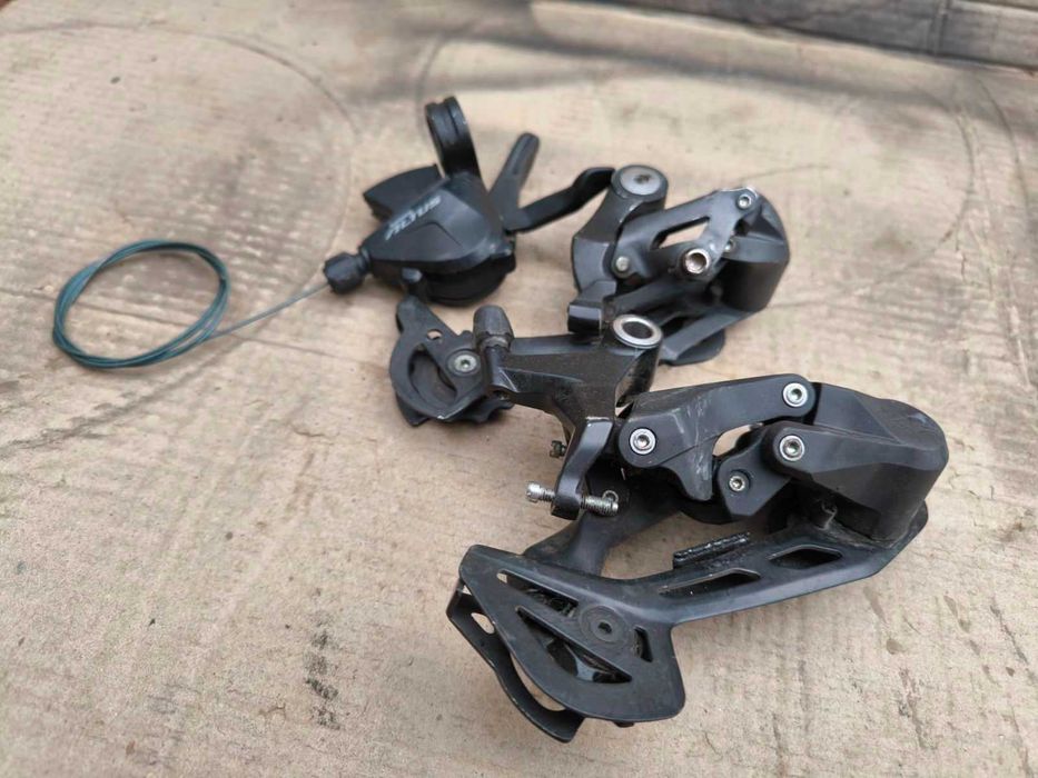 Переключатель скоростей Shimano Acera, Altus, Cues