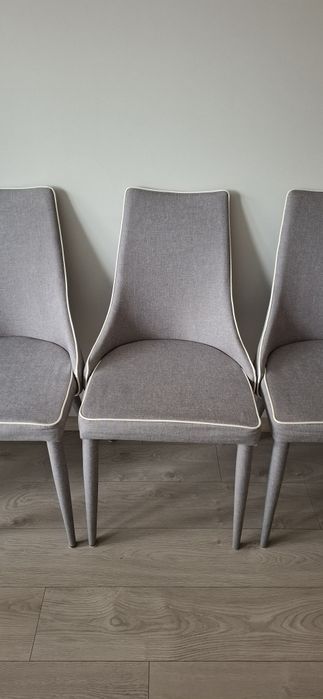 Krzesła szare z białą lamówką