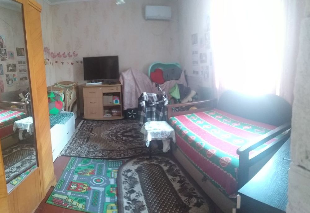 Продается1/2часть дома на ХБК.