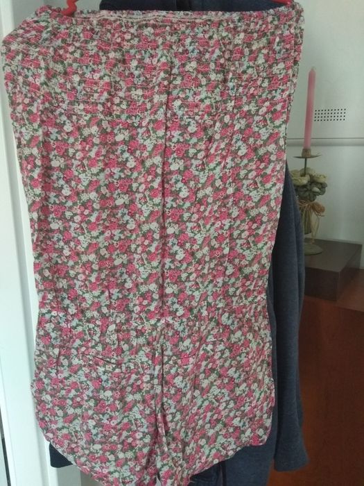 Macacão calção as flores praia ou campo.Super giro.