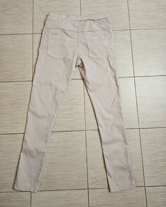 jasne spodnie rurki Made in Italy 38/M