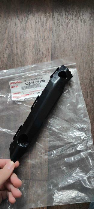 Кронштейн бампера переднего левый, Toyota, 5253606190