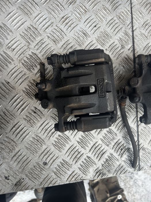 Задний суппорт Мазда сх7 mazda cx7