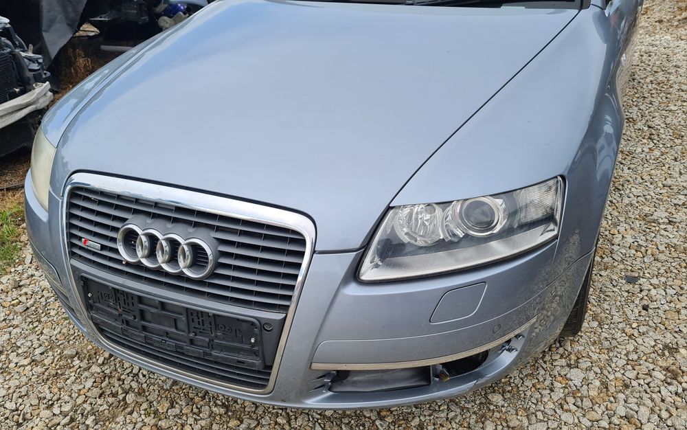 LEWY BŁOTNIK przedni Audi A6 C6 2005r LY7J