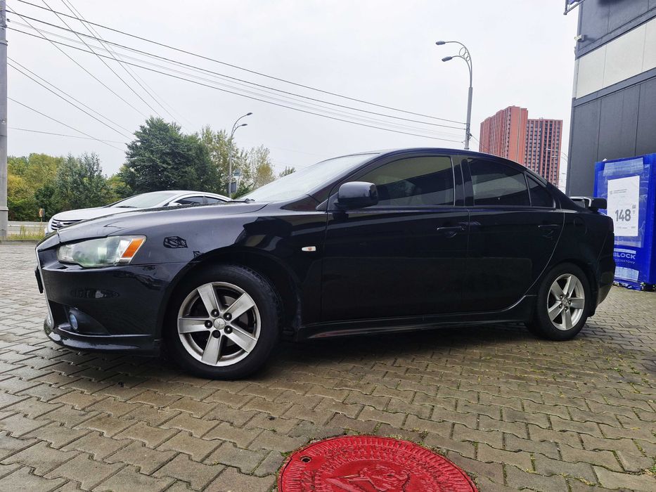 Митсубиши Лансер Х