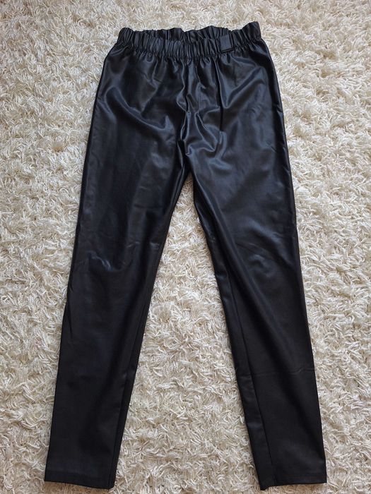 Штани з еко-шкіри для дівчинки на 11 років.