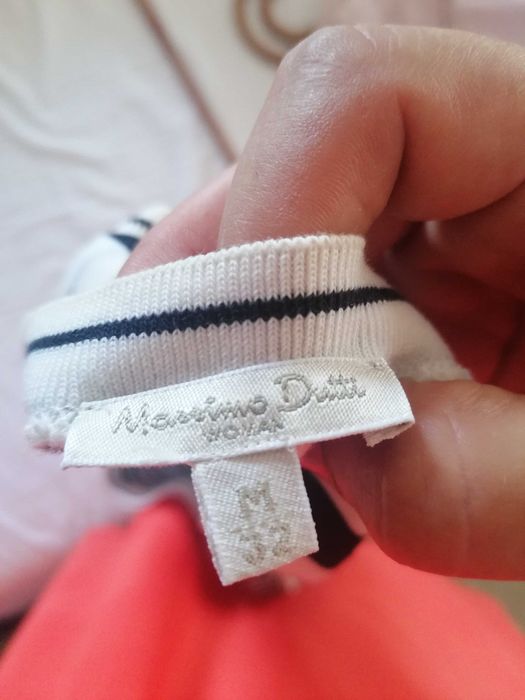 T shirt sem mangas às riscas.