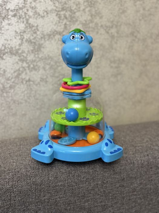 Дитяча дзига-юла бегемот з кульками