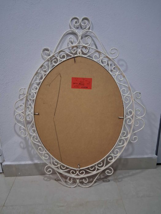 espelho ornamentado com ferro trabalhado