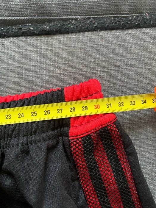 Calças de treino pretas e vermelhas do Manchester United 2021, 2022