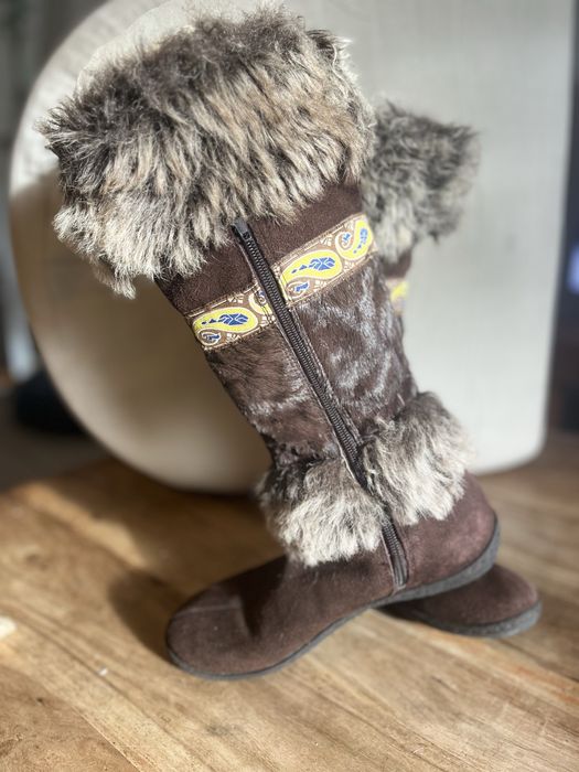 Botas castanhas de Pelo