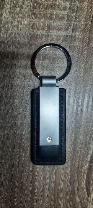 Продам брелок на ключи KIA UQ016AY744