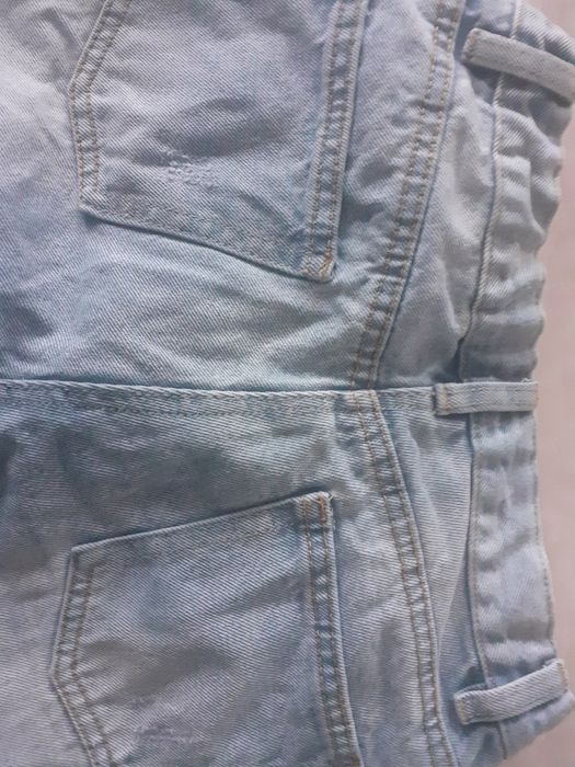 Spodnie jeans 146 delikatnie przecierane