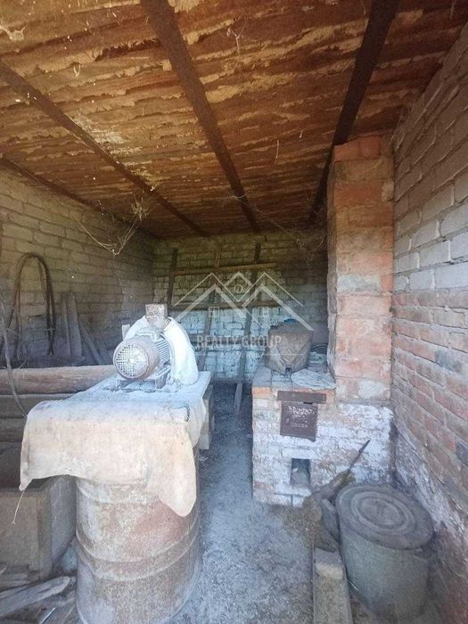 Продаж будинку в центрі с. Лозуватка з гаражем, літнею кухнею.