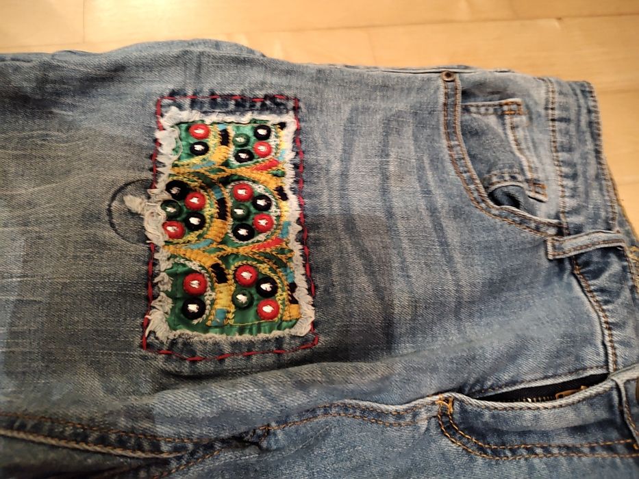 Niebieskie jeansy Desigual - r.30
