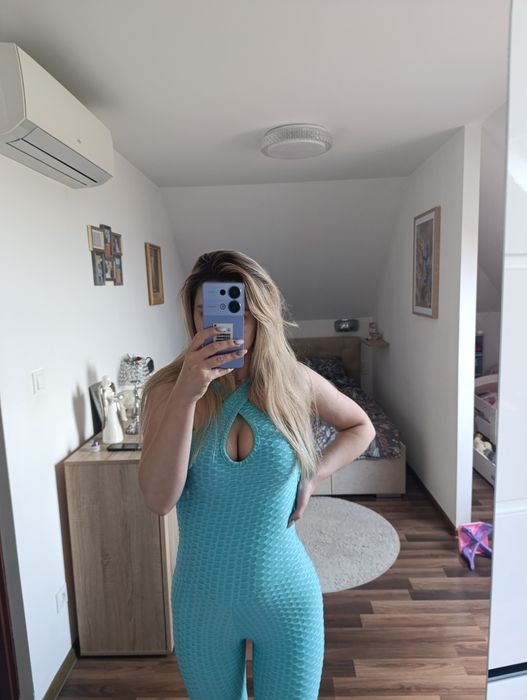 Kombinezon sexy wycięcie dekolt kobiecy XS s modny długi