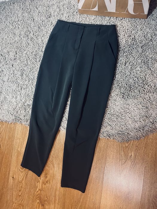 Ciemnozielone damskie spodnie s biurowe