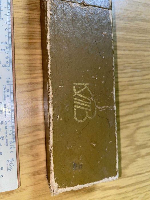 Логарифмічні лінійки у футлярі