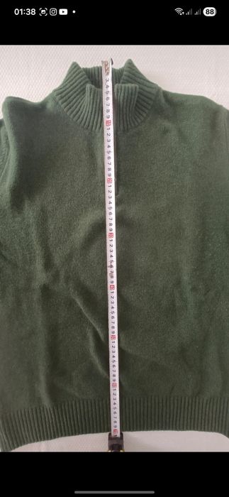 Camisola gola alta com fecho