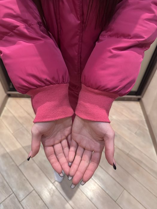 Зимний пуховик розовый длинный