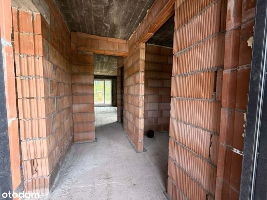 Nowoczesny dom w zabudowie bliźniaczej – 167 m² z garażem i poddaszem.