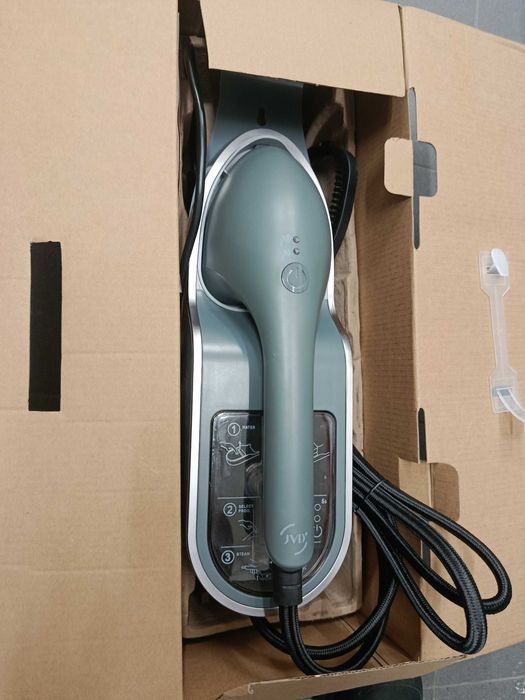 Ferro de passar roupa a vapor