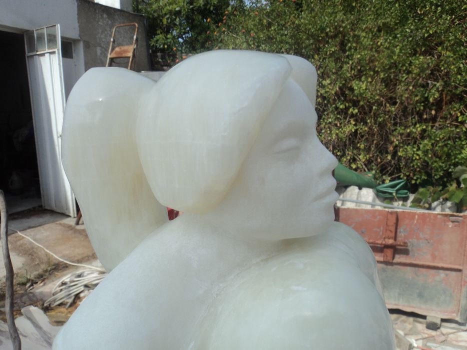 Escultura em pedra onix