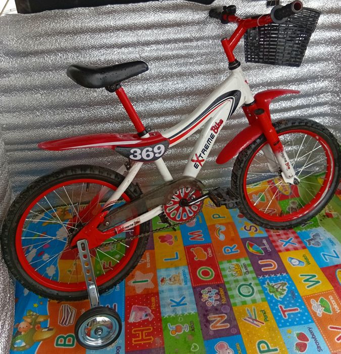 Продам детский велосипед Extreme Bike на 18 дюймов+колесики.
