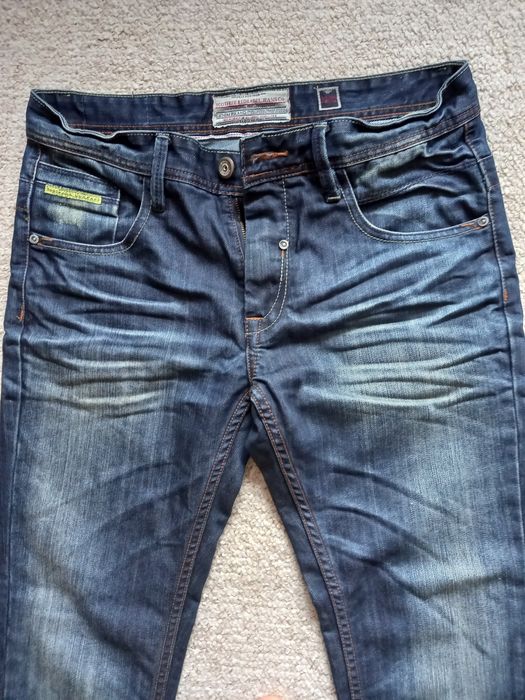 Sprzedam  nowe spodnie jeansowe SCOTFREE 32x32