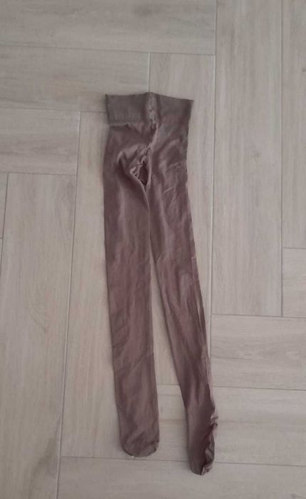 Meias calças em tom castanho