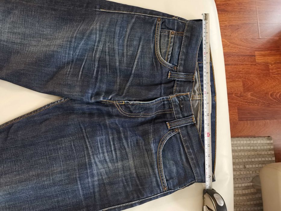 Spodnie jeansowe marki Levis 506 używane, męskie  W33 L34,