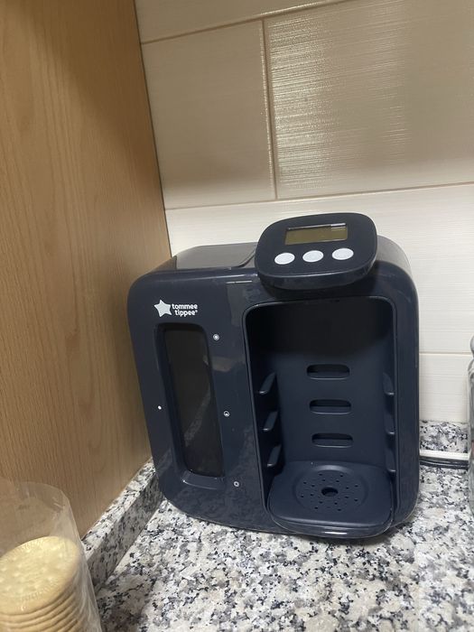 Maquina para preparar leite bebe