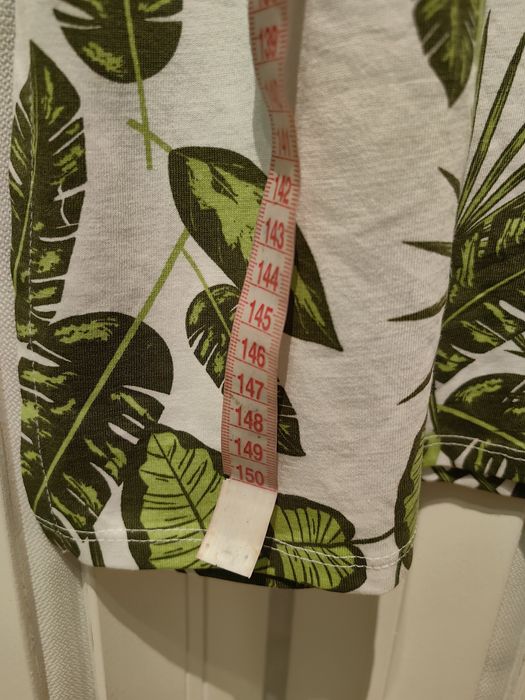 Nowa długa biała sukienka w zielone liście z wiązanym paskiem